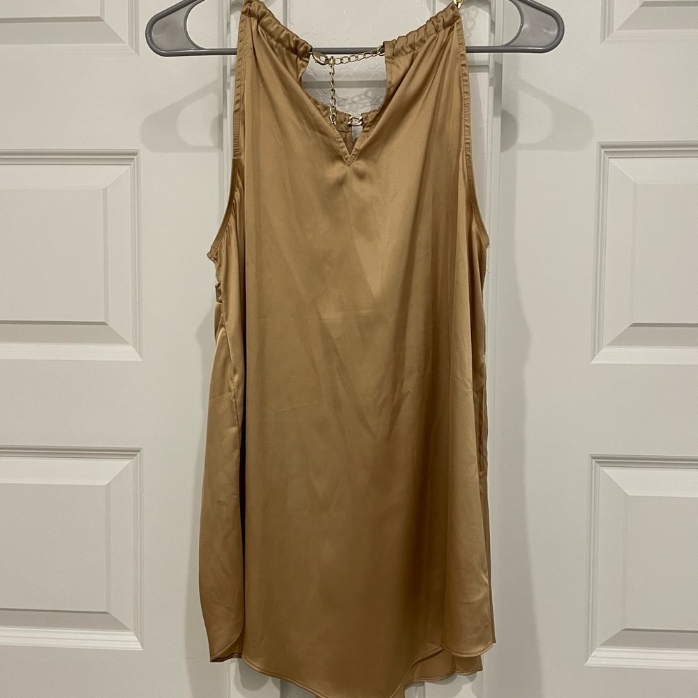Gold shirt with gold straps